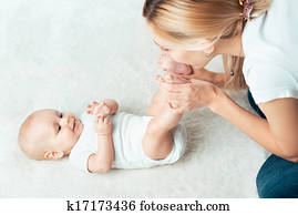 Baby with mum is making massage Baby with mum is making massage