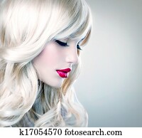 Beautiful Blond Girl with Healthy Long Wavy Hair. White Hair 
