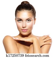 Beauty Model Girl Looking at Camera. Skin Care Concept 