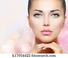 Beauty Portrait. Beautiful Spa Woman Touching her Face Beauty Portrait. Beautiful Spa Woman Touching her Face