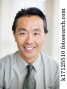 Cancer Specialist Doctor Smiling In Hospital