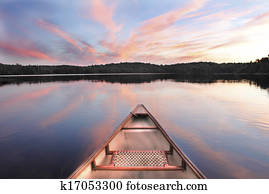 Canoe Bow on a Lake at Sunset Canoe Bow on a Lake at Sunset