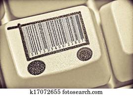 Computer key with a shopping cart symbol on it, Computer key with a shopping cart symbol on it,