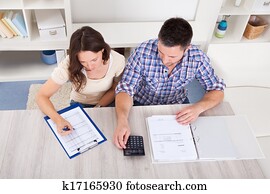 Couple Calculating Bills