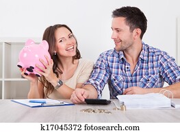 Couple Saving Money