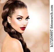 Hair Braid. Beautiful Woman with Healthy Long Brown Hair