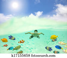 happy young man swimming undersea with colorful fishes and bubble