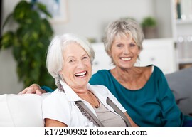 Laughing senior women relaxing at home