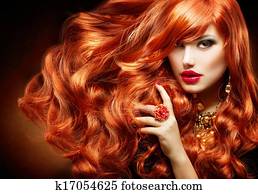 Long Curly Red Hair. Fashion Woman Portrait