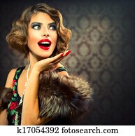 Retro Woman Portrait. Surprised Lady. Vintage Styled Photo