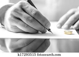 Signing divorce paper Signing divorce paper