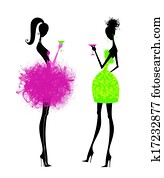 Two Chic Young Women in Party Dresses Two Chic Young Women in Party Dresses