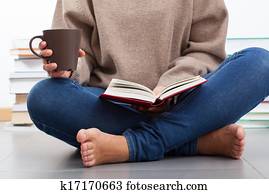 Woman reading a book Woman reading a book