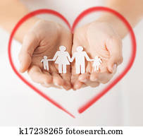 womans hands with paper man family womans hands with paper man family