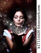 young christmas woman holding magic stars