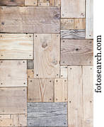 Blocks of eco-friendly natural reclaimed wood screwed together to form a flat pattern wall surface; Honolulu, Oahu, Hawaii, United States of America