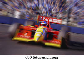 Formula racing car at speed Formula racing car at speed