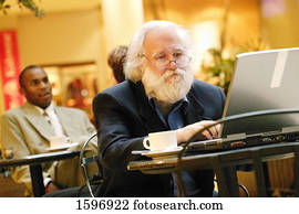Senior on a computer