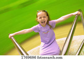 Child on merry-go-round