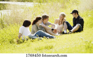 Group of young people in field Group of young people in field