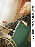 Elderly woman in wheelchair Elderly woman in wheelchair