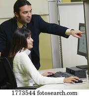 Adult man and woman in the office