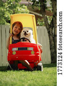 Dog and girl on a road trip