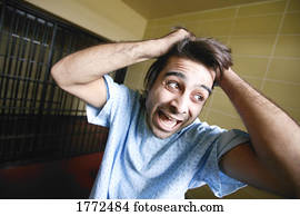 Man exhibiting bizarre behavior