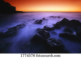 Sunset/rise over water