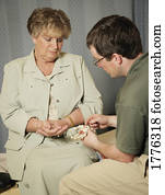 A physiotherapist with a patient