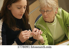 Bandage over woman's finger