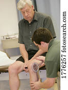 Physiotherapist with a patient