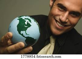 Businessman with the world in his hand
