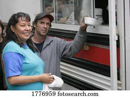 Homeless people receiving lunch