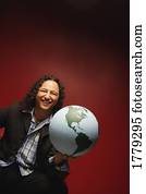 Man holds the world in his hand