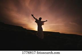 Man with arms out stretched