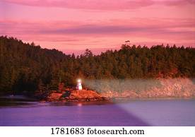 Lighthouse on rocky shore