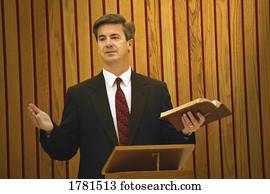 Pastor preaches from the pulpit