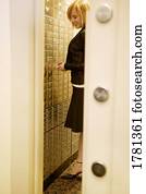 Woman accessing security deposit box