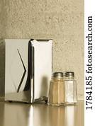 A set of salt and pepper on a diner table