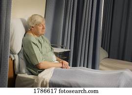 Senior in a hospital bed