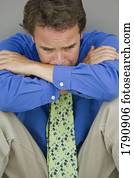 Man with sad and worried facial expression