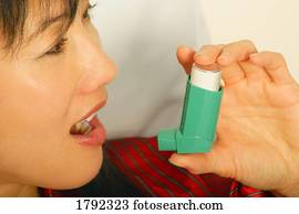 Women using inhaler
