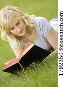 Young woman reading Bible
