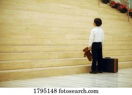 Boy travelling alone