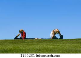 Two young girls with flexibility