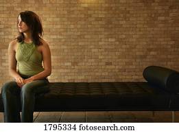 Woman sitting alone on