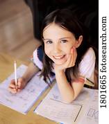 Little girl happy to do homework