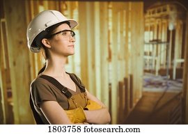 Side view of a woman wearing helmet and smiling
