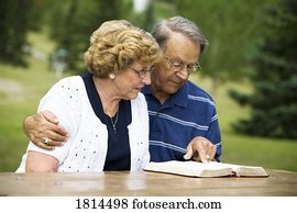Senior couple reading Bible Senior couple reading Bible